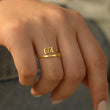 Load image into Gallery viewer, A model wearing a 666 Angel Number Gold ring
