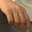 Load image into Gallery viewer, A model wearing a 888 Angel Number Gold ring