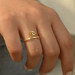 Load image into Gallery viewer, A model wearing a 555 angel number gold ring