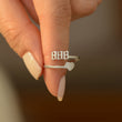 Load image into Gallery viewer, A model holding a 888 Angel Number Silver ring