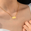 Load image into Gallery viewer, A model wearing 444 angel number pendant gold necklace