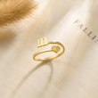 Load image into Gallery viewer, 111 angel number gold ring placed on top of a piece of paper