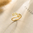 Load image into Gallery viewer, 222 Angel number gold ring placed on top of a piece of paper