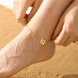 Load image into Gallery viewer, A model wearing a 111 Angel Number Gold Anklet