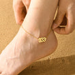 Load image into Gallery viewer, A model wearing a 333 Angel Number Gold Anklet