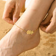 Load image into Gallery viewer, A model wearing a 888 Angel Number Gold Anklet