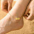 Load image into Gallery viewer, A model wearing a 999 Angel Number Gold Anklet