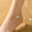 Load image into Gallery viewer, A model wearing a 444 Angel Number Silver-plated Anklet