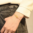 Load image into Gallery viewer, A model wearing an Angel Number 666 Bracelet