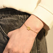 Load image into Gallery viewer, A model wearing an Angel Number 111 Bracelet