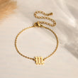 Load image into Gallery viewer, Angel Number 111 gold bracelet on a canvas background