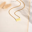 Load image into Gallery viewer, 555 angel number pendant gold necklace laid out